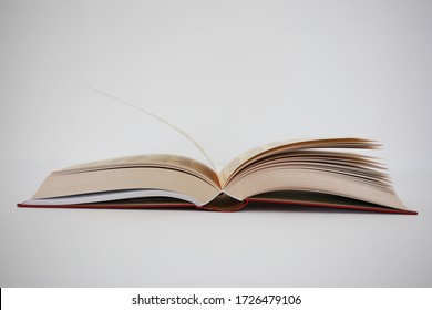 Open Book On White Background