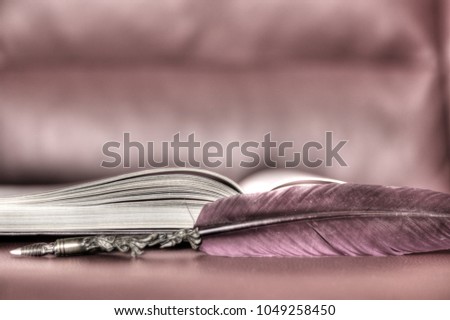 An open book and a pen