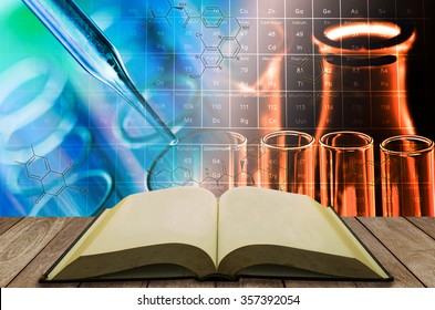 Open Book With Science Laboratory Test Tube Background