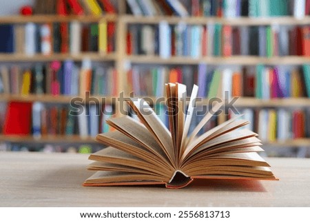 An open book is a symbol of knowledge, learning, wisdom, and the accessibility of information. It can also symbolize transparency and a willingness to share ideas. great photo showing the book