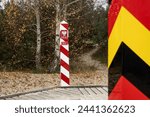 open border between Germany and Poland. Area between seaside resort Ahlbeck and Świnoujście. Boundary stones face each other.