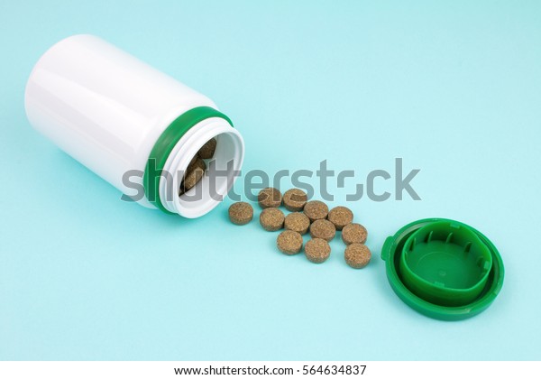 Download Open Bottle Pills Blue Background Stock Image Download Now Yellowimages Mockups