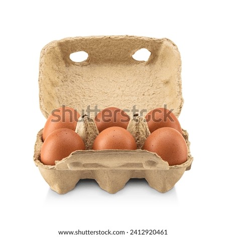 Open box with six eggs isolated on white background with clipping path.