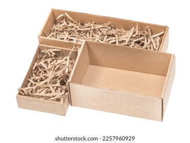 Open сardboard boxes for gifts or package with kraft paper shavings isolated on white background. Corrugated cardboard paper carton cargo container close up. parcels - Shutterstock ID 2257960929