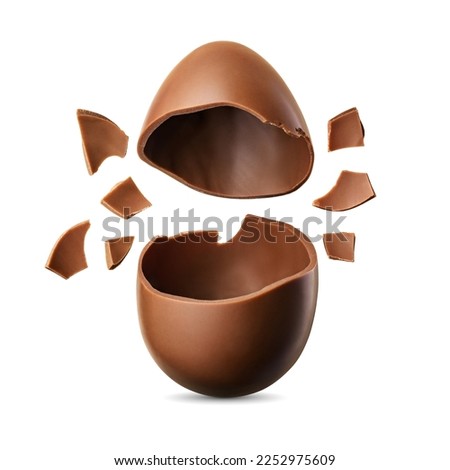 Open broken chocolate Easter egg isolated on white background with clipping path.