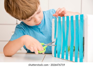 Open The Cage. Liberation Of Animals. Fighting Animal Cruelty And Neglect. Boy Cutting Paper Rods Of The Cage To Liberate Elephant. Implement To Train Fine Motor Skils, Learning To Cut With Scissors. 