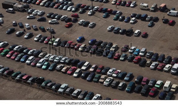 Open car parking top view. Parking with cars from a\
bird\'s eye view