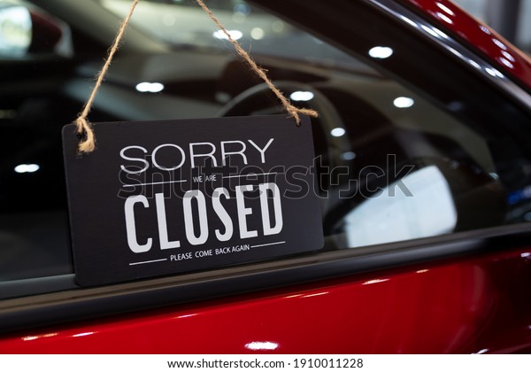 open car  with red car in dealership for door\
car  ideas unlock freedom tourist travel for lifestyle customer\
from salesman sign welcome new normol during Coronavirus disease\
covid-19  unlock lockdown