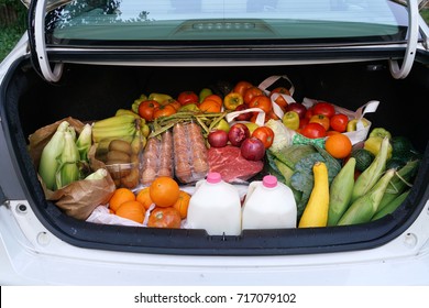 Open Car Trunk Full Of Fresh Food From Grocery Store