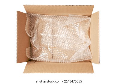 An open cardboard box with bubble wrap. The concept of packaging parcels with fragile cargo. Isolated on white