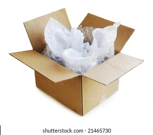 Open Cardboard Box With Tissue Paper And Bubble Wrap.