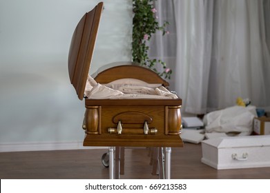 An Open Casket Inside A Funeral Home