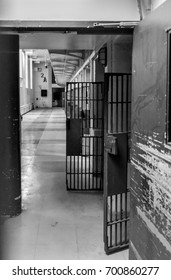 Open Cell Doors In A Prison Cell Block.