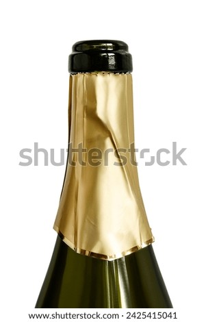 Open champagne green glass bottleneck with golden foil closeup isolated over white