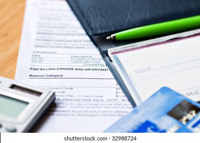 Open Checkbook With Credit Cards And Statement