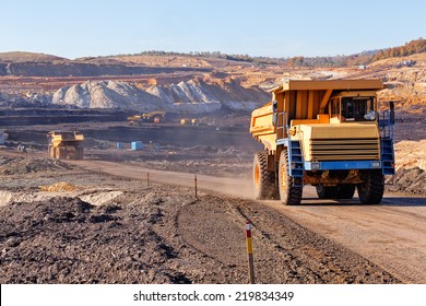 Open Coal Mining Pit With Heavy Machinery