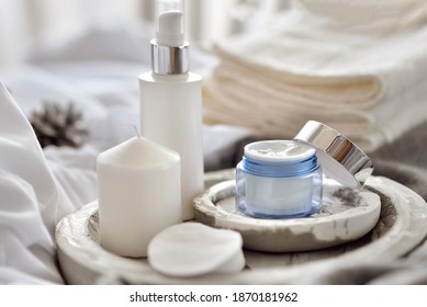 Open Container, Jar With Face Cream. Bottles For Skin Care In The Bedroom With Cozy Winter Home Decor. Winter Season Cosmetics Banner With Space For Text. Selective Focus. Winter Skin Care Concept