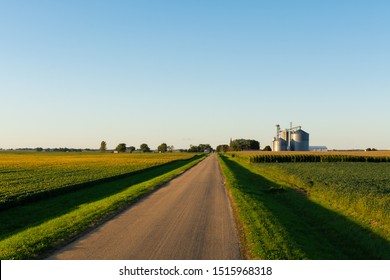 Open Country Road Leading To Small Midwest Town.  Illinois, USA