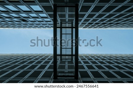 open covered bridges outside a high-rise building. low angle view.
