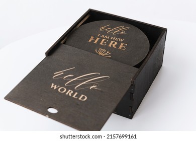 Open Dark Wooden Box With The Inscription On A White Background Top View