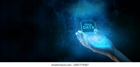 Open Data Concept: Promoting Transparency and Accessibility Illustrated on a Processor Touched by a Human Hand.