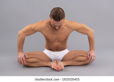 Open The Deepest Part Of Your Hip Muscles. Yogi Man Do Bound Angle Pose. Practicing Thighs Stretch. Yoga Stretch. Butterfly Asana. Baddha Konasana.