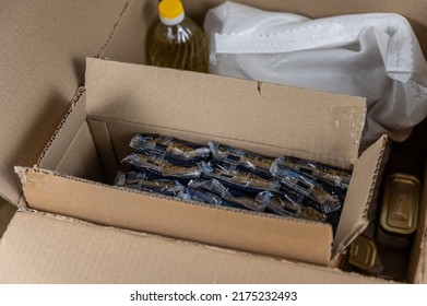 Open donation box with various groceries. Top view. Selective focus. No people. - Shutterstock ID 2175232493