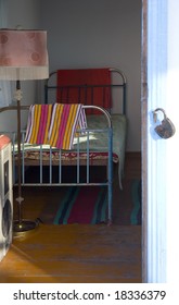 The Open Door In A Bedroom Of The Poor Rural House