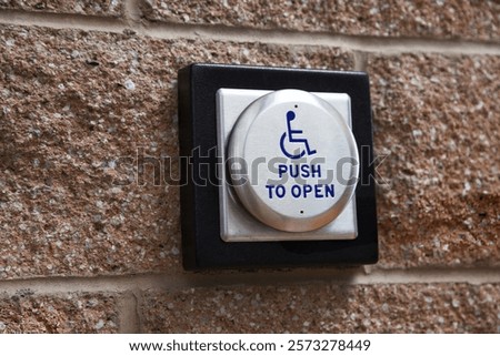 Open door button for handicapped.