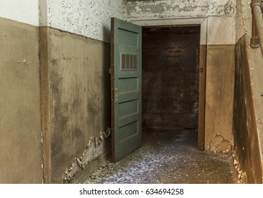 Open Door Leading To Scary Hallway In An Abandoned Factory