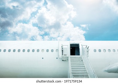 Open Door And Stairstep From Airplane With Blue Sky For Luxury Travel In Summer Background