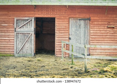 Open Door In A Wooden Barn Building