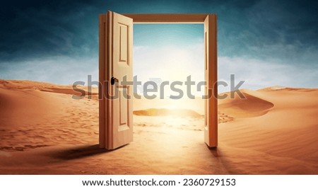 open doors guiding a path in the middle of a desert with a beautiful sky