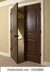 Open Double Dark Wood Door To Bathroom