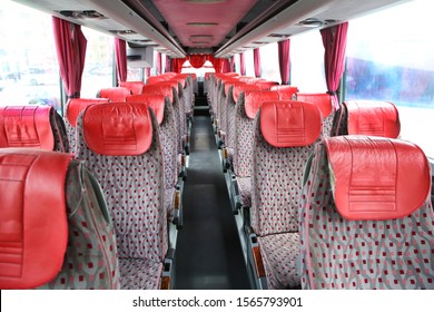 Open Double Interior Of New Modern Red Chairs Bus . Interior Of New Modern Bus . Bus Seat Safety Belts . Interior Of Big Coach Bus With Leather Seats .