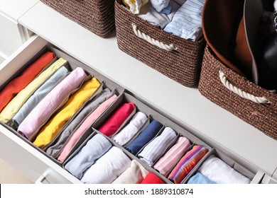 Open Drawer With Clean Clothes In Closet