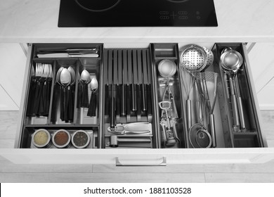 Open Drawer With Stainless Steel Utensil Set. Order In Kitchen