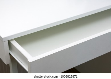 open a drawer in the table, background with copy space