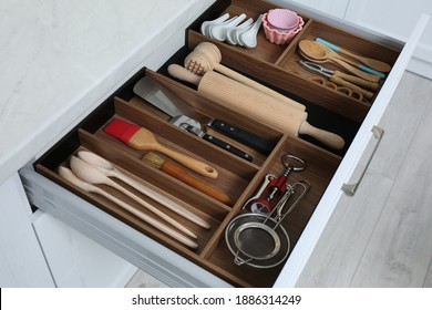 Open Drawer With Utensil Set Indoors. Order In Kitchen