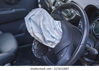 Open Driver Airbag From Steering Wheel In Small Car Traffic Accident Danger