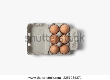 open egg pack , Brown chicken eggs in carton or raw chicken eggs in egg box isolated on white background