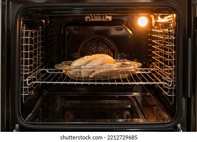 Open Electric Oven With Hot Air Ventilation. New Oven. Door Is Open And Light Is On. 