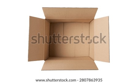 Open empty brown cardboard box with flaps extended