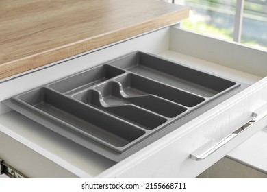 Open Empty Drawer For Cutlery In Modern Kitchen