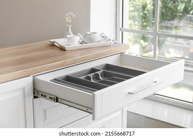 Open Empty Drawer For Cutlery In Modern Kitchen