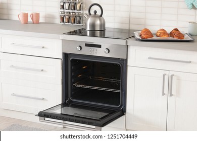 Open Empty Electric Oven In Modern Kitchen