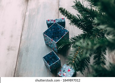 Open And Empty Gift Boxes Under Christmas Tree, Copy Space Left