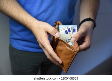 An Open Empty Purse Without Money In It