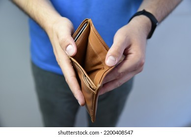 An Open Empty Purse Without Money In It