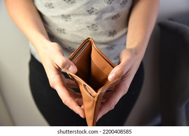 An Open Empty Purse Without Money In It